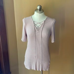 Women’s top got Maurices size small. Mauve and white pinstripe.